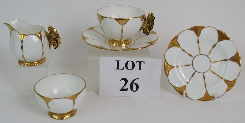 A five piece Aynsley China gilded butterfly tea set c1920s consisting of cup and saucer, plate,