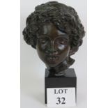 A good quality cast bronze bust of David after the antique, signed Donatello,