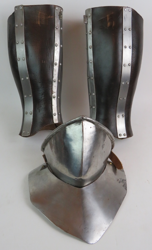 A medieval re-enactment pair of leather and steel leg guards, a steel throat protector, - Image 4 of 14