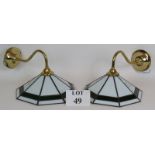 A pair of Franklite Art Deco style wall lamps with green and white stained glass shades mounted on