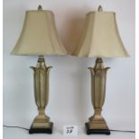 An elegant pair of contemporary gilt lotus leaf shaped lamps with matching shades. (Pr).