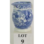 A rare William IV Staffordshire blue and white quart measure jug depicting the royal coat of arms