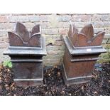 A pair of antique stoneware castellated chimney pots/planters, possibly by Royal Doulton,