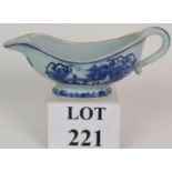 A late 18th/early 19th Century Chinese porcelain sauce boat with blue hand painted decoration.