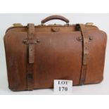 A good quality vintage leather travel case with brass fittings and fully lined circa 1930's. 56cm