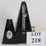 A black Japanned Maelzel metronome with bell, dated 1965. Height 22cm. Condition report: Feet