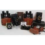 Five vintage photographic cameras including an Eastman Kodak IA folding pocket and an AGFA