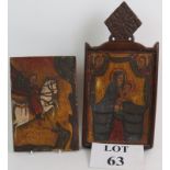 A two part carved hardwood Ethiopian Christian icon depicting St George on one panel and the Madonna