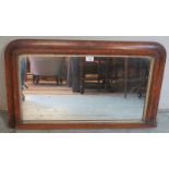 A 19th century walnut framed giltwood edged over mantle mirror, crossbanded and strung with