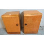 A pair of Art Deco birds eye maple bedside cabinets with chamfered square wooden handles, with