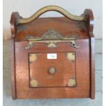 A Victorian mahogany brass mounted coal scuttle. 36cm high x 35cm wide x 46cm deep (approx)