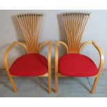 A pair of contemporary 'Totem' fan back chairs in beech by Torstein Nilsen for Westnofa, upholstered