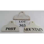 Three early 19th Century porcelain cellar labels, one unglazed, the other labelled as Port and