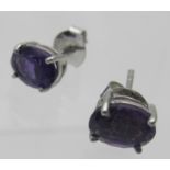 A pair of oval amethyst earrings, stamped 925. Condition report: Good condition. Estimated: £50-£70