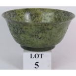 A large Chinese carved spinach Jade bowl, 27cm in diameter, 12cm tall. Very finely carved to a