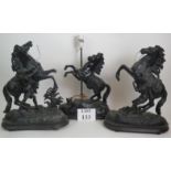 A pair of Spelter Marley style horses and a third horse later converted into a lamp. Height 43cm. (