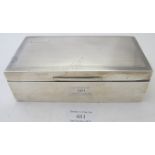 A silver cigarette box with engine turned decoration, Birmingham 1929. Condition report: Good