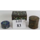 Three Chinese Cloisonné on brass enamel boxes all with floral decoration. Largest 12cm x 8.5cm. (3).