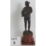 A fine quality bronze figure of a peasant boy, circa 1900, signed Fritz Heinemann, mounted on a