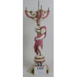 A 19th Century Minton porcelain three branch candelabra, the central column being formed of a