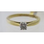 An 18ct gold single stone diamond set ring, diamond approx 0.14cts, approx weight 2.8 grams, size L.