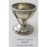 A small silver 'Dunlop Golf Ball Hole in One' souvenir cup decorated with two golf clubs, Birmingham