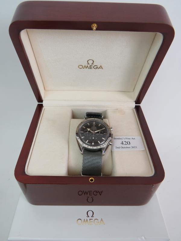 An Omega Speedmaster automatic chronograph watch, Broad Arrow model with all original paperwork.