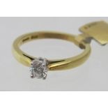 An 18ct gold single stone diamond set ring, diamond approx 0.21cts, approx weight 3.2 grams, size L.