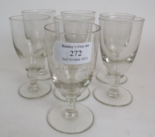 Seven Early 19th Century short stem wine glasses each with a bladed knop. Height: 11.5cm.
