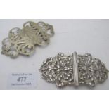 A silver nurse's buckle, Birmingham 1894, with foliate decoration, 34 grams, and a plated nurse's