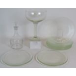 An oversized champagne coupe 27cm tall, a contemporary Scandinavian style decanter and a set of 7