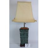 A bronze based table lamp cast in the Chinese Shang Dynasty style, C1930s, with double lamp holder