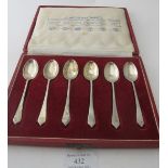 A set of six silver teaspoons commemorating the Coronation of the Queen, depicting British hallmarks