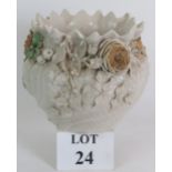 An early 20th Century Belleek porcelain jardinière with ornate applied flowers and foliage. 2nd
