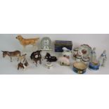 A collection of seven Beswick pottery animals, a Wedgwood bone china clock, Copeland gilt