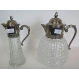 A large white metal mounted glass jug with ice reservoir and a matching claret jug. (2). Condition