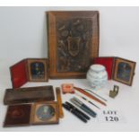 Three cased 19th Century photographic portraits, a carved oak portfolio, Chinese porcelain jar,