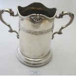 A fine silver wine cooler, Sheffield 1908 with two double scroll handles and shell decoration around