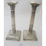 A pair of Corinthian candlesticks, Sheffield 1916, approx 9" high. Condition report: Some biffs