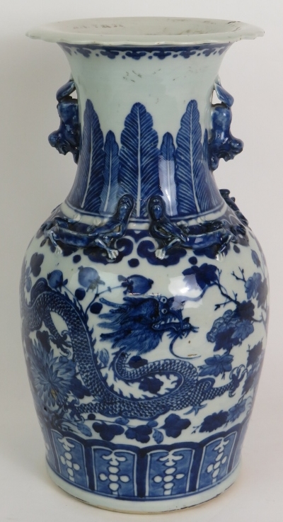 An antique blue and white Chinese porcelain vase decorated with four claw dragons and with applied - Image 3 of 5