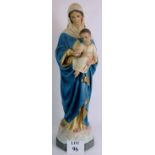 A large vintage plaster figure of the Madonna and child painted in polychrome colours. Height