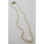A good quality strand of individually knotted graduated pearls, ranging from 5.8mm to 9.9mm. The 9ct