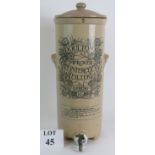 An antique Doulton's Improved Germ Intercepting Filter Stoneware urn with lid and tap. Overall