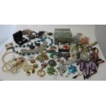 A large collection of vintage jewellery and hatpins to include a large collection of brooches.