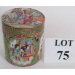 An antique Chinese porcelain Canton Famille rose decorated covered jar, both parts signed. Height