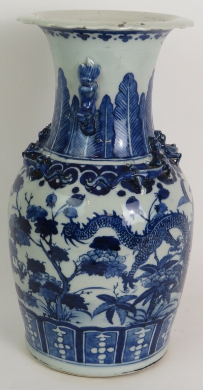 An antique blue and white Chinese porcelain vase decorated with four claw dragons and with applied - Image 2 of 5