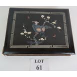 A 1920s Japanese lacquered and inlaid photo album containing over 30 early 20th Century Christmas