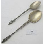 A pair of continental white metal apostle spoons, probably German, marks on revers, approx weight