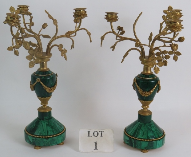 A pair of antique French Malachite bronze Ormulu mounted candelabra each with rose form three branch