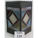 An Edwardian stained glass hall lantern with geometric design leaded glass panels within a pressed